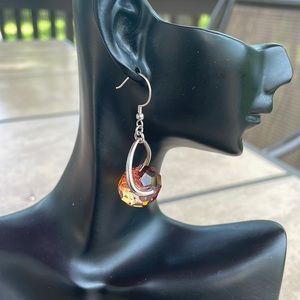 Stunning peachy apricot earrings 2 inches/5 cm long. It moves with you